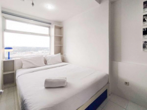 Spaicous 1BR with City View at Grand Asia Afrika Apartment By Travelio